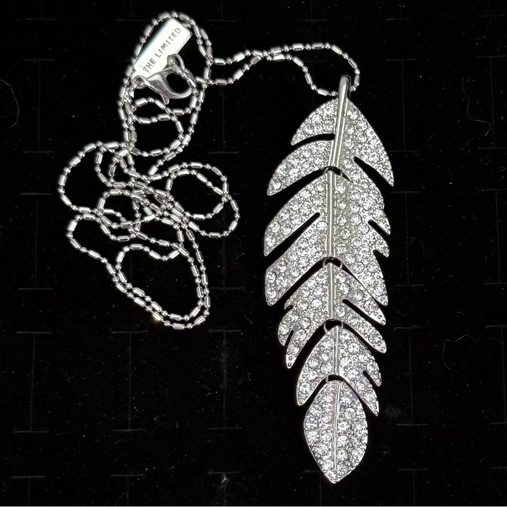 Silvertone Hinged Bling Leaf Pendant Long Necklace